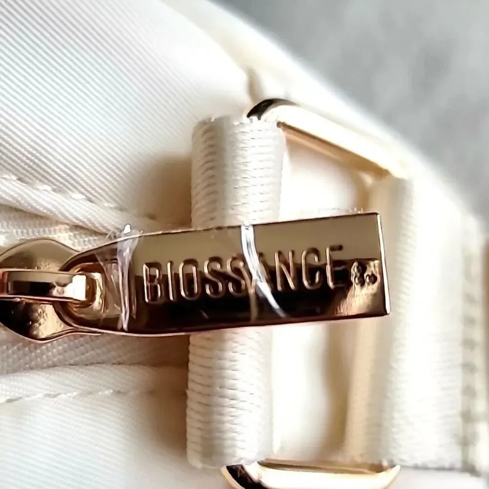 NWT Gorgeous Biossance White/ Ivory Satin Light Cushion adjustable crossbody bag